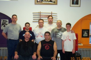 Sifu Bruce Nepon (seated left) with his Sifu, Master James Cama (seated right), with students at a recent seminar